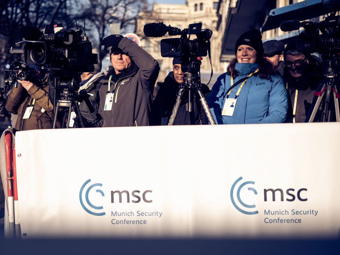 Journalists and media representatives in front of the Bavarian Court at the Munich Security Conference 2025.